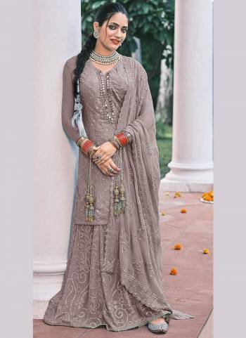 For Bold And Beautiful Look,GrabThese Designer Sharara Suit in Fine Colored.These Top And Bottom Are Fabricated On Georgette Pair With Georgette Dupatta.Its Beautified With Heavy Thread,Sequance Embroidery Work.