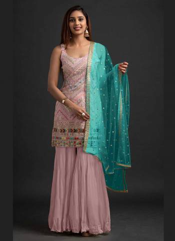 For A Beautiful Look,Grab These Fine Colored Suit.These Top And Dupatta Are Fabricated On Faux Georgette Pair With Santoon Bottom.Its Beautified With Heavy Thread,Sequance Embroidery Work.