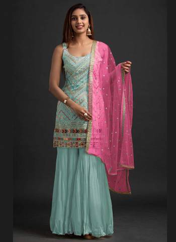 For A Beautiful Look,Grab These Fine Colored Suit.These Top And Dupatta Are Fabricated On Faux Georgette Pair With Santoon Bottom.Its Beautified With Heavy Thread,Sequance Embroidery Work.