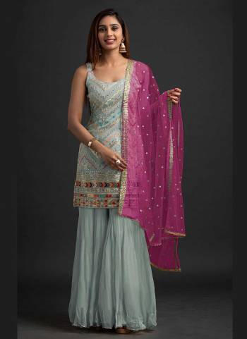 For A Beautiful Look,Grab These Fine Colored Suit.These Top And Dupatta Are Fabricated On Faux Georgette Pair With Santoon Bottom.Its Beautified With Heavy Thread,Sequance Embroidery Work.