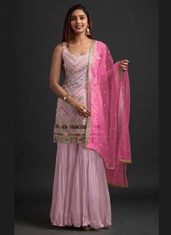 For A Beautiful Look,Grab These Fine Colored Suit.These Top And Dupatta Are Fabricated On Faux Georgette Pair With Santoon Bottom.Its Beautified With Heavy Thread,Sequance Embroidery Work.