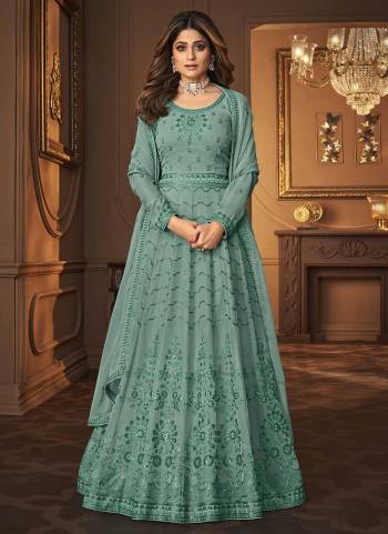 For A Designer Look,Grab These Designer Suit In All Over Fine Colored.These Top And Dupatta Are Fabricated On Georgette Pair With Silk Santoon Bottom.Its Beautified With Heavy Designer Work.