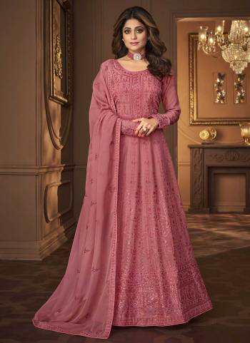 For A Designer Look,Grab These Designer Suit In All Over Fine Colored.These Top And Dupatta Are Fabricated On Georgette Pair With Silk Santoon Bottom.Its Beautified With Heavy Designer Work.