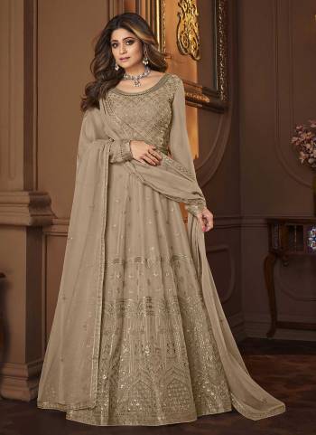 For A Designer Look,Grab These Designer Suit In All Over Fine Colored.These Top And Dupatta Are Fabricated On Georgette Pair With Silk Santoon Bottom.Its Beautified With Heavy Designer Work.