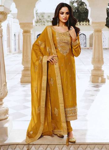 For A Different Look,Grab These Suit in Fine Colored.These Top And Dupatta Are Fabricated On Dola Silk Pair With Santoon Bottom.Its Beautified With Heavy Designer Embroidery Work.