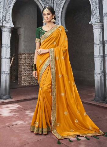 Grab These Fine Colored Saree Pair With Blouse.These Saree is Fabricated On Vichitra Silk Pair With Phantom Silk Blouse.Its Beautified With Designer Jari Embroidery Work.