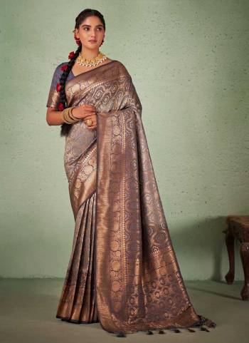 Grab These Saree in Fine Colored Pair With Blouse.These Saree And Blouse Are Fbaricated On Raw Silk.Its Beautified With Heavy Wevon Designer Work.