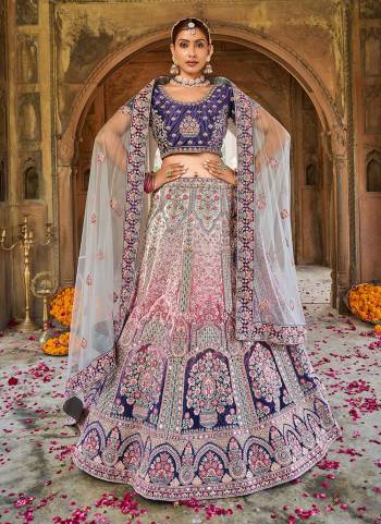 For A Designer Look,Grab These Lehenga in Fine Colored Pair With Blouse And Designer Dupatta.These Blouse And Lehenga Are Fabricated On Velvet Pair With Soft Net Dupatta.Its Beautified With Heavy Designer Embroidery,Hand Work.