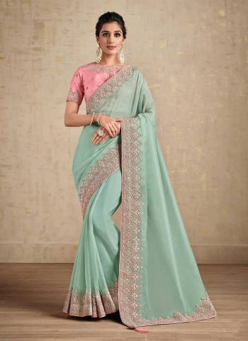 For A Beautiful Look,Grab These Saree in Fine Colored Pair With Blouse.These Saree is Fabricated On Net Organza Pair With Raw Silk Blouse.Its Beautified With Designer Work.