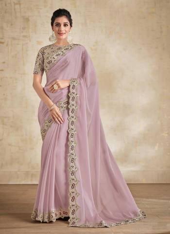 For A Beautiful Look,Grab These Saree in Fine Colored Pair With Blouse.These Saree is Fabricated On Satin Silk Pair With Silk Blouse.Its Beautified With Designer Work.