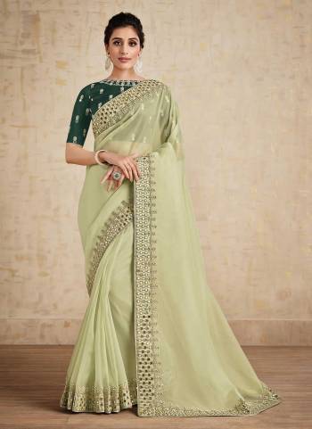 For A Beautiful Look,Grab These Saree in Fine Colored Pair With Blouse.These Saree is Fabricated On Net Organza Pair With Raw Silk Blouse.Its Beautified With Designer Work.