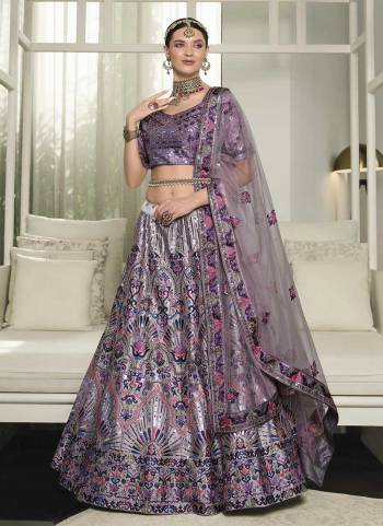 Grab These Fine Colored Lehenga Choli.These Lehenga And Blouse Are Fabricated On Silk Pair With Silk Dupatta.Its Beautified With Heavy Thread,Sequance Embroidery Work.