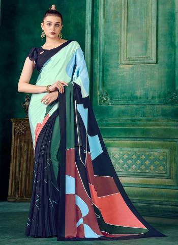 Grab These Fine Colored Saree Pair With Blouse.These Saree And Blouse Are Fabricated On Crepe.Its Beautified With Fancy Designer Printed Work.