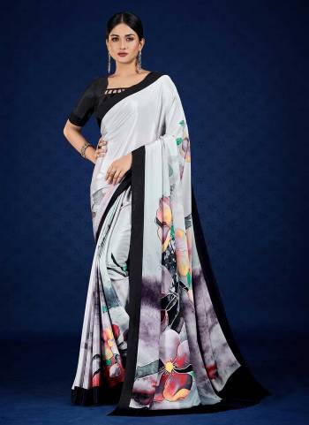 Grab These Fine Colored Saree Pair With Blouse.These Saree And Blouse Are Fabricated On Crepe.Its Beautified With Fancy Designer Printed Work.