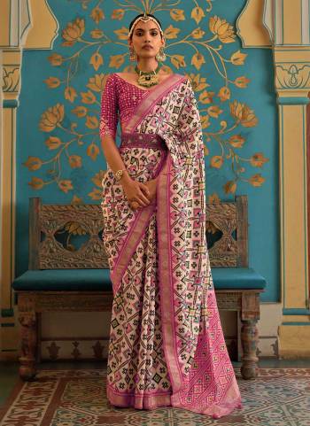 Grab These Festive Wear Saree in Fine Colored.These Saree is Fabricated On Patola Silk Pair With Silk Blouse.Its Beautified With Wevon Designer,Printed,Swarovski Embroidery Work.