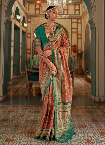 Grab These Festive Wear Saree in Fine Colored.These Saree is Fabricated On Patola Silk Pair With Silk Blouse.Its Beautified With Wevon Designer,Printed,Swarovski Embroidery Work.