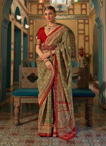 Grab These Festive Wear Saree in Fine Colored.These Saree is Fabricated On Patola Silk Pair With Silk Blouse.Its Beautified With Wevon Designer,Printed,Swarovski Embroidery Work.