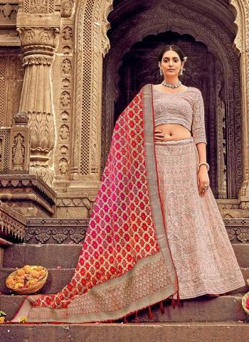 For A Designer Look,Grab These Lehenga Choli in Fine Colored.These Lehenga And Blouse Are Fabricated On Georgette Pair With Dolla Silk Dupatta.Its Beautified With Heavy Lakhnovi Embroidery Work With Wevon Designer Dupstta.