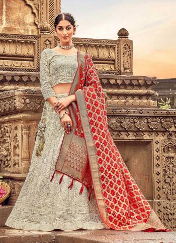 For A Designer Look,Grab These Lehenga Choli in Fine Colored.These Lehenga And Blouse Are Fabricated On Georgette Pair With Dolla Silk Dupatta.Its Beautified With Heavy Lakhnovi Embroidery Work With Wevon Designer Dupstta.