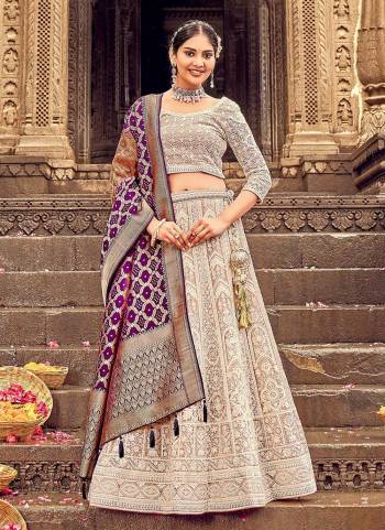 For A Designer Look,Grab These Lehenga Choli in Fine Colored.These Lehenga And Blouse Are Fabricated On Georgette Pair With Dolla Silk Dupatta.Its Beautified With Heavy Lakhnovi Embroidery Work With Wevon Designer Dupstta.