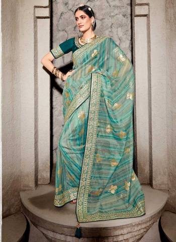 Attrective Looking These Festive Wear Saree in Fine Colored.These Saree is Fabricated On Khadi Silk Pair With Phantom Silk Blouse.Its Beautified With Designer Printed,Resham,Jari Embroidery Work.