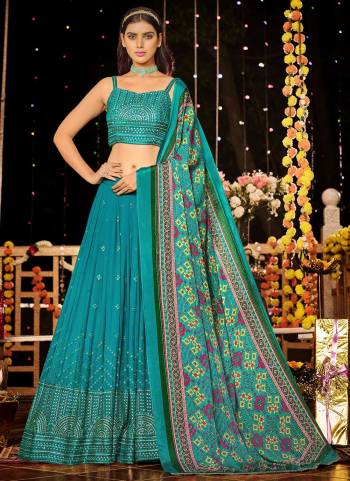 For A Designer Look,Grab These Readymade Lehenga Choli in Fine Colored.These Lehenga And Blouse Are Fabricated On Viscose Georgette Pair With Chinon Dupatta.Its Beautified With Sequance Embroidery Work With Printed Dupatta.