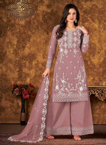 Grab These Suit in Fine Colored Pair With Bottom And Dupatta.These Top And Dupatta Are Fabricated On Net Pair With Santoon Bottom.Its Beautified With Santoon Bottom.Its Beautified With Heavy Designer Codding Embroidery,Stone Work.