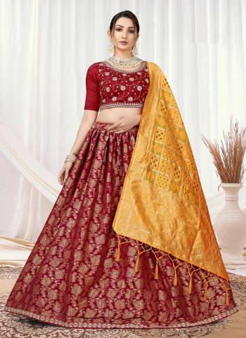 Grab These Lehenga Choli in Fine Colored.These Lehenga Are Silk And Blouse Are Viscose Silk Fabricated Pair With Banarasi Silk Dupatta.Its Beautified With Wevon Designer With Embroidery Work.