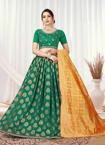 Grab These Lehenga Choli in Fine Colored.These Lehenga Are Silk And Blouse Are Viscose Silk Fabricated Pair With Banarasi Silk Dupatta.Its Beautified With Wevon Designer With Embroidery Work.