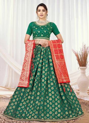 Grab These Lehenga Choli in Fine Colored.These Lehenga Are Silk And Blouse Are Viscose Silk Fabricated Pair With Banarasi Silk Dupatta.Its Beautified With Wevon Designer With Embroidery Work.