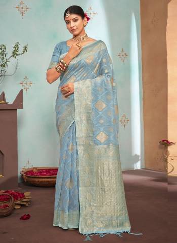 Grab These Festive Wear Saree in Fine Light Colored.These Saree And Blouse is Fabricated On Organza Pair.Its Beautified With Weavon Designer Work.