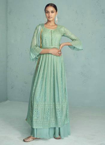 Garb These Suit in Fine Colored Pair With Bottom And Dupatta.These Top And Dupatta Are Fabricated On Georgette Pair And Dull Santoon Bottom.Its Beautified With Heavy Designer Embroidery Work.