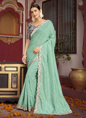 Grab These Festive Wear Saree in Fine Light Colored.These Saree And Blouse is Fabricated On Dola Silk.Its Beautified With Designer Foil Printed,Gota Patti With Diamond Border,Patola Printed Blouse.