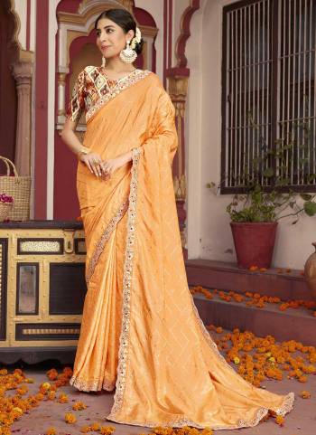 Grab These Festive Wear Saree in Fine Light Colored.These Saree And Blouse is Fabricated On Dola Silk.Its Beautified With Designer Foil Printed,Gota Patti With Diamond Border,Patola Printed Blouse.