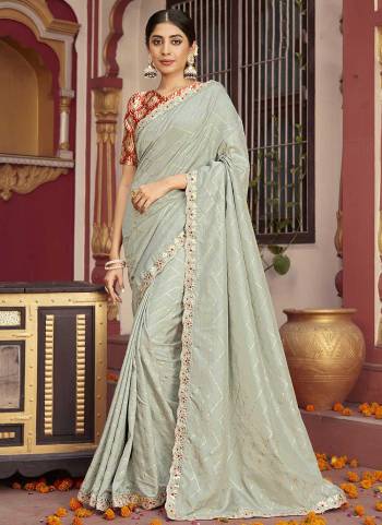 Grab These Festive Wear Saree in Fine Light Colored.These Saree And Blouse is Fabricated On Dola Silk.Its Beautified With Designer Foil Printed,Gota Patti With Diamond Border,Patola Printed Blouse.