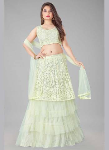 For A Designer Look,Grab These Lehenga Choli in Fine Colored.These Lehenga And Blouse Are Fabricated On Net Pair With Net Dupatta.Its Beautified With Designer Embroidery Work.