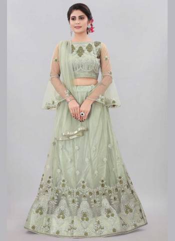 For A Designer Look,Grab These Lehenga Choli in Fine Colored.These Lehenga And Blouse Are Fabricated On Net Pair With Net Dupatta.Its Beautified With Designer Embroidery Work.