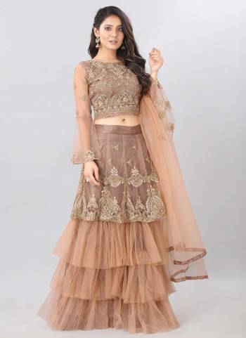 For A Designer Look,Grab These Lehenga Choli in Fine Colored.These Lehenga And Blouse Are Fabricated On Net Pair With Net Dupatta.Its Beautified With Jari,Embroidery Work.