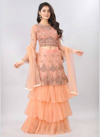 For A Designer Look,Grab These Lehenga Choli in Fine Colored.These Lehenga And Blouse Are Fabricated On Net Pair With Net Dupatta.Its Beautified With Jari,Embroidery Work.