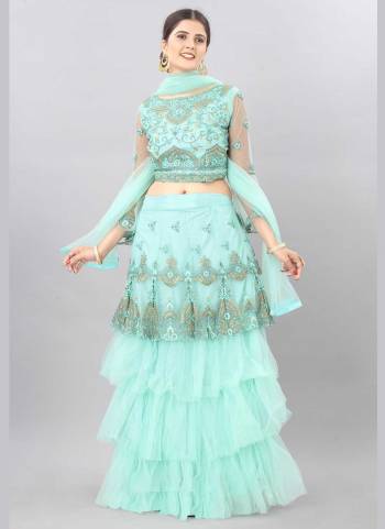 For A Designer Look,Grab These Lehenga Choli in Fine Colored.These Lehenga And Blouse Are Fabricated On Net Pair With Net Dupatta.Its Beautified With Jari,Embroidery Work.