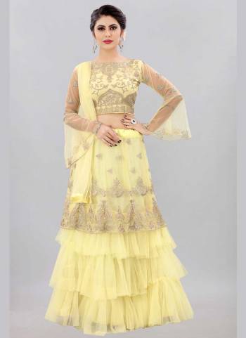 For A Designer Look,Grab These Lehenga Choli in Fine Colored.These Lehenga And Blouse Are Fabricated On Net Pair With Net Dupatta.Its Beautified With Jari,Embroidery Work.