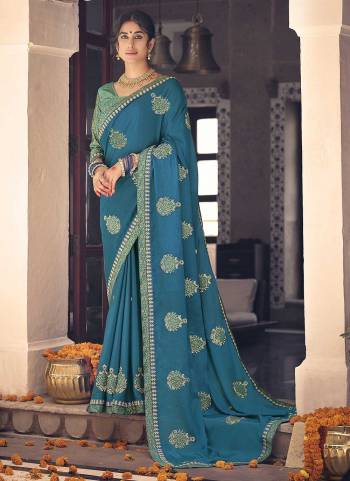 Grab These Party Wear Saree in Fine Colored.These Saree Are Chinon And Blouse is Fabricated On Brocade.Its Beautified With Designer Embroidery Work With Brocade Blouse.