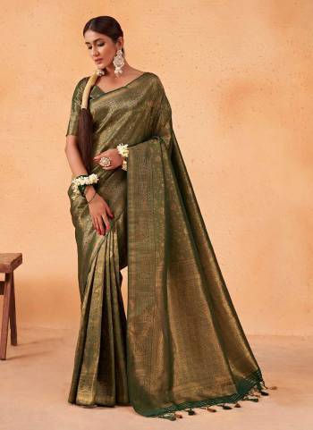 Garb These Festive Wear Saree in Fine Colored.These Saree And Blouse is Fabricated On Kanjivaram Silk.Its Beautified With Weavon Designer Work.