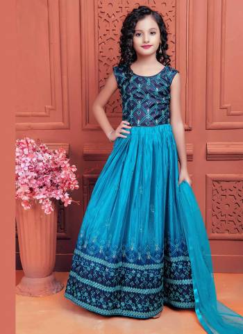 A Designer Look These Readymade Kidswear Lehenga Choli in Fine Colored.These Lehenga Are Chinon Silk And Blouse Are Fabricated On Banglori Silk Pair With Net Dupatta.Its Beautified With Sequance,Thread Embroidery Work.