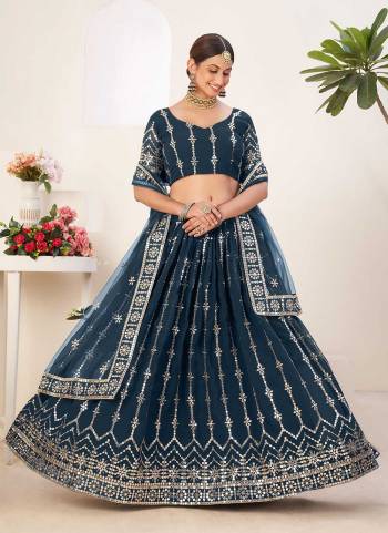 For A Designer Look,Grab These Lehenga Choli in Fine Colored.These Lehenga And Blouse Are Fabricated On Faux Georgette Pair With Net Dupatta.Its Beautified With Sequance Embroidery Work.