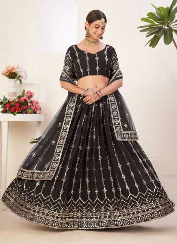 For A Designer Look,Grab These Lehenga Choli in Fine Colored.These Lehenga And Blouse Are Fabricated On Faux Georgette Pair With Net Dupatta.Its Beautified With Sequance Embroidery Work.