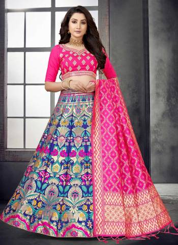 For A Designer Look,Grab These Lehenga Choli in Fine Colored.These Lehenga And Dupatta Are Fabricated On Banarasi Silk Pair With Modal Chanderi Blouse.Its Beautified With Wevon Designer,Mirror Embroidery Work.