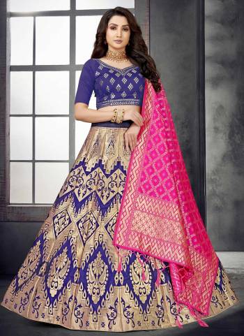 For A Designer Look,Grab These Lehenga Choli in Fine Colored.These Lehenga And Dupatta Are Fabricated On Banarasi Silk Pair With Modal Chanderi Blouse.Its Beautified With Wevon Designer,Mirror Embroidery Work.