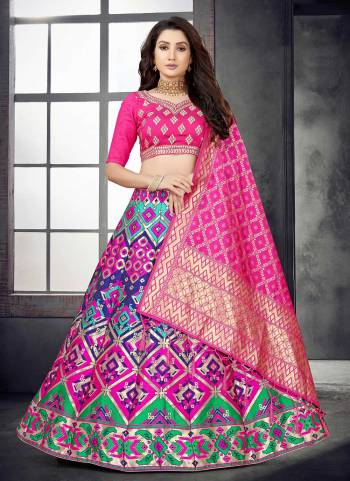 For A Designer Look,Grab These Lehenga Choli in Fine Colored.These Lehenga And Dupatta Are Fabricated On Banarasi Silk Pair With Modal Chanderi Blouse.Its Beautified With Wevon Designer,Mirror Embroidery Work.