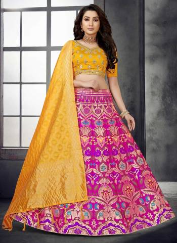 For A Designer Look,Grab These Lehenga Choli in Fine Colored.These Lehenga And Dupatta Are Fabricated On Banarasi Silk Pair With Modal Chanderi Blouse.Its Beautified With Wevon Designer,Mirror Embroidery Work.